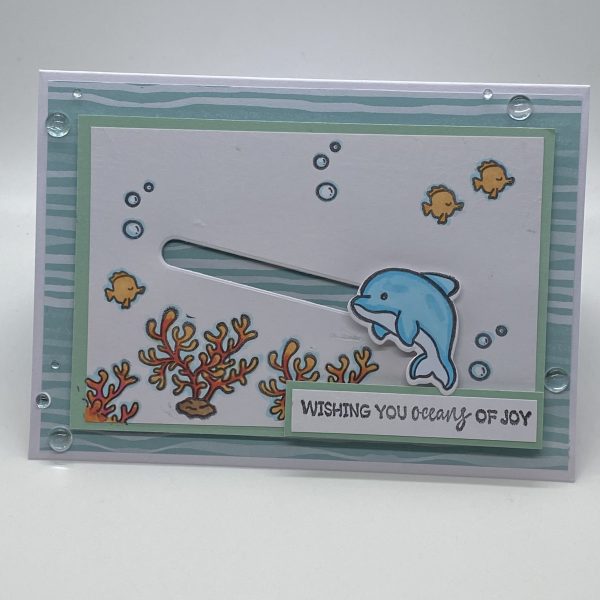 Dolphin Twirling Slider Card