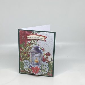 Lantern With Poinsettias and Pinecones Card