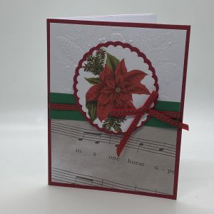 Poinsettia On Musical Paper Card