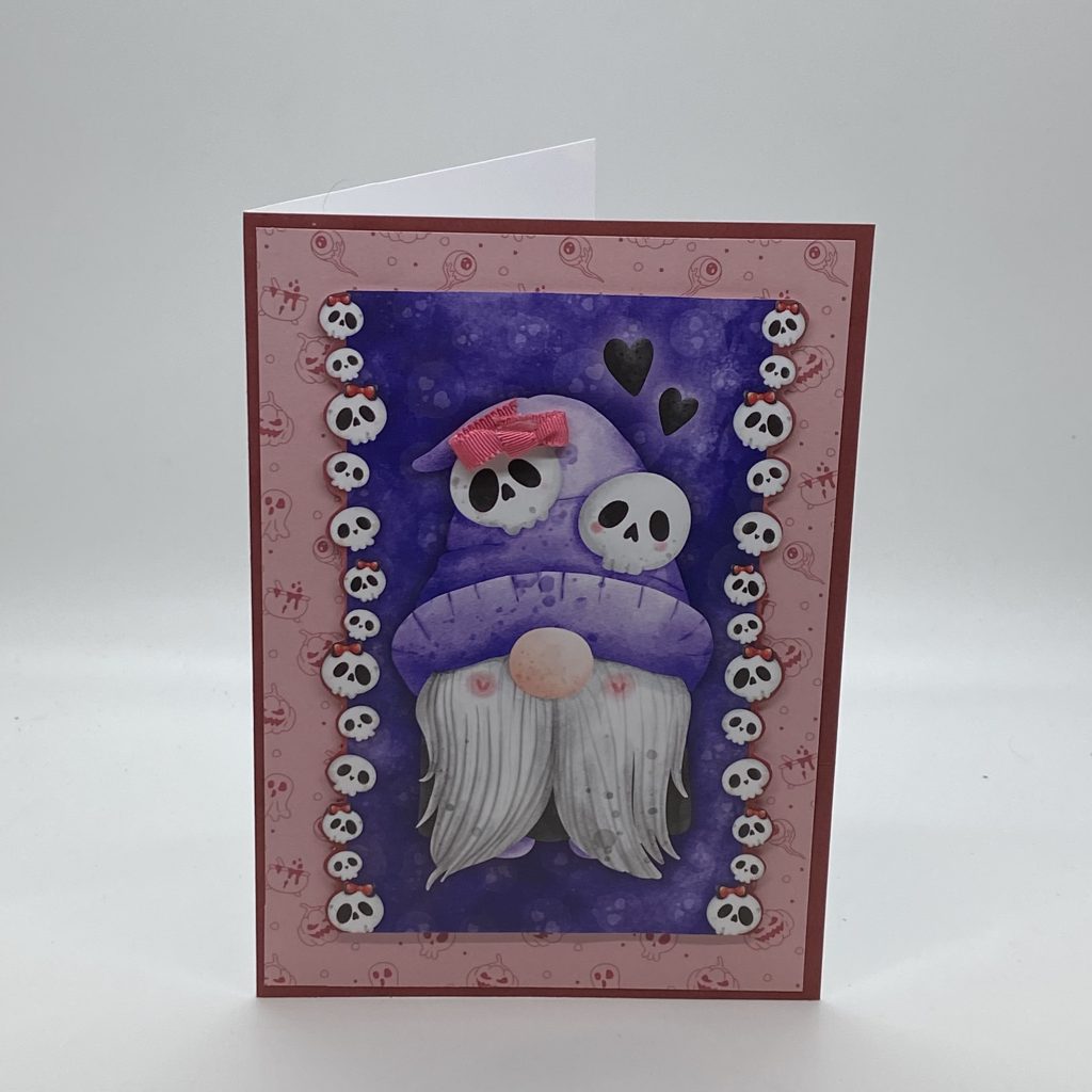 Skulls With Bows On Purple Background Card