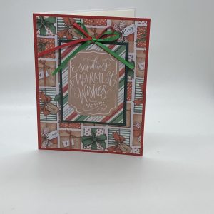 White Script On Red And Green Striped Background With Bow To Match Card